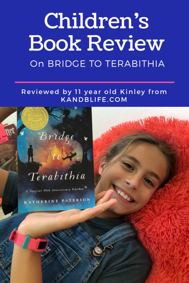 For the children's book review, 11 year old girl holding the book Bridge to Terabithia.