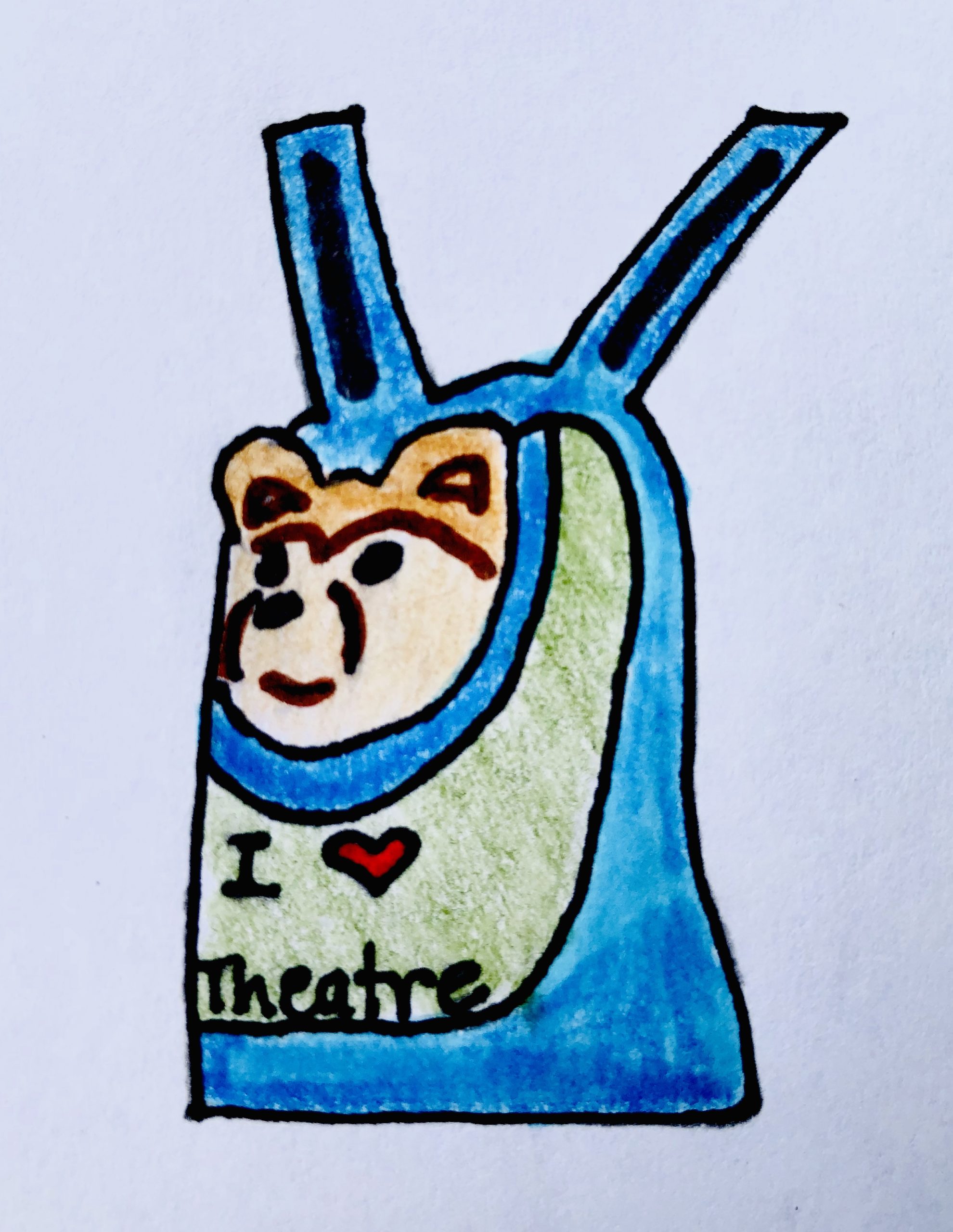 In a blue and green backpack is a Pomeranian stuffed animal dog. His head is sticking out and the backpack has "I love Theatre" on the front. It's from the mystery story for kids, The Case of the Stolen Stuffy.