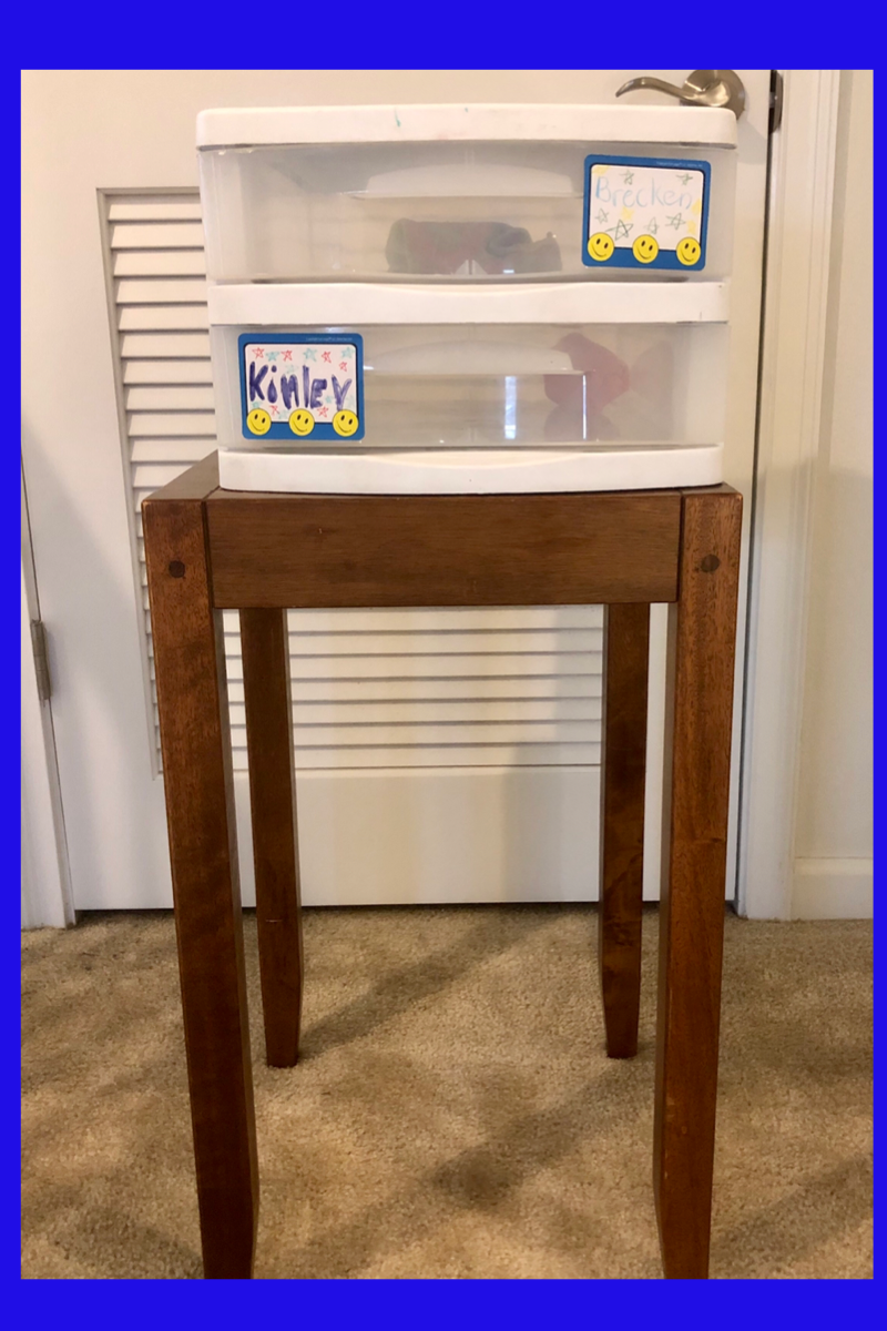 Plastic Bins turned into homemade mailboxes for the article 10 ways to get kids excited about writing