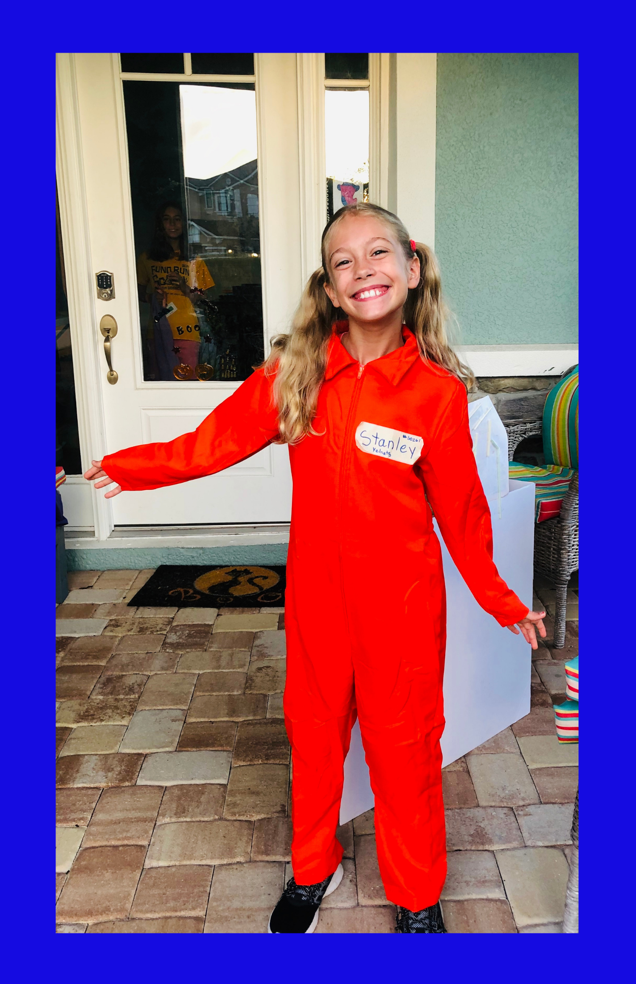 A blonde girl dressed as Stanley Yelnats for the book Holes. Children's Books Gift Guide 2020.