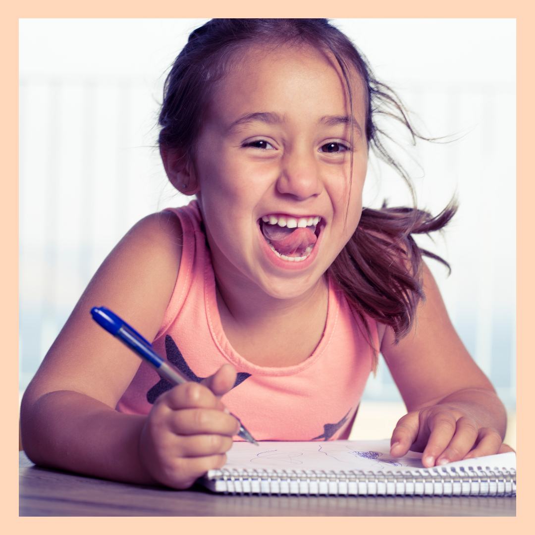  A girl being happy writing in a Gratitude Journal called My 5 Little Things